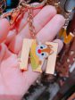 SHDL - Chip, Dale & Clarice English Alphabet ‘M’ Keychain on Sale